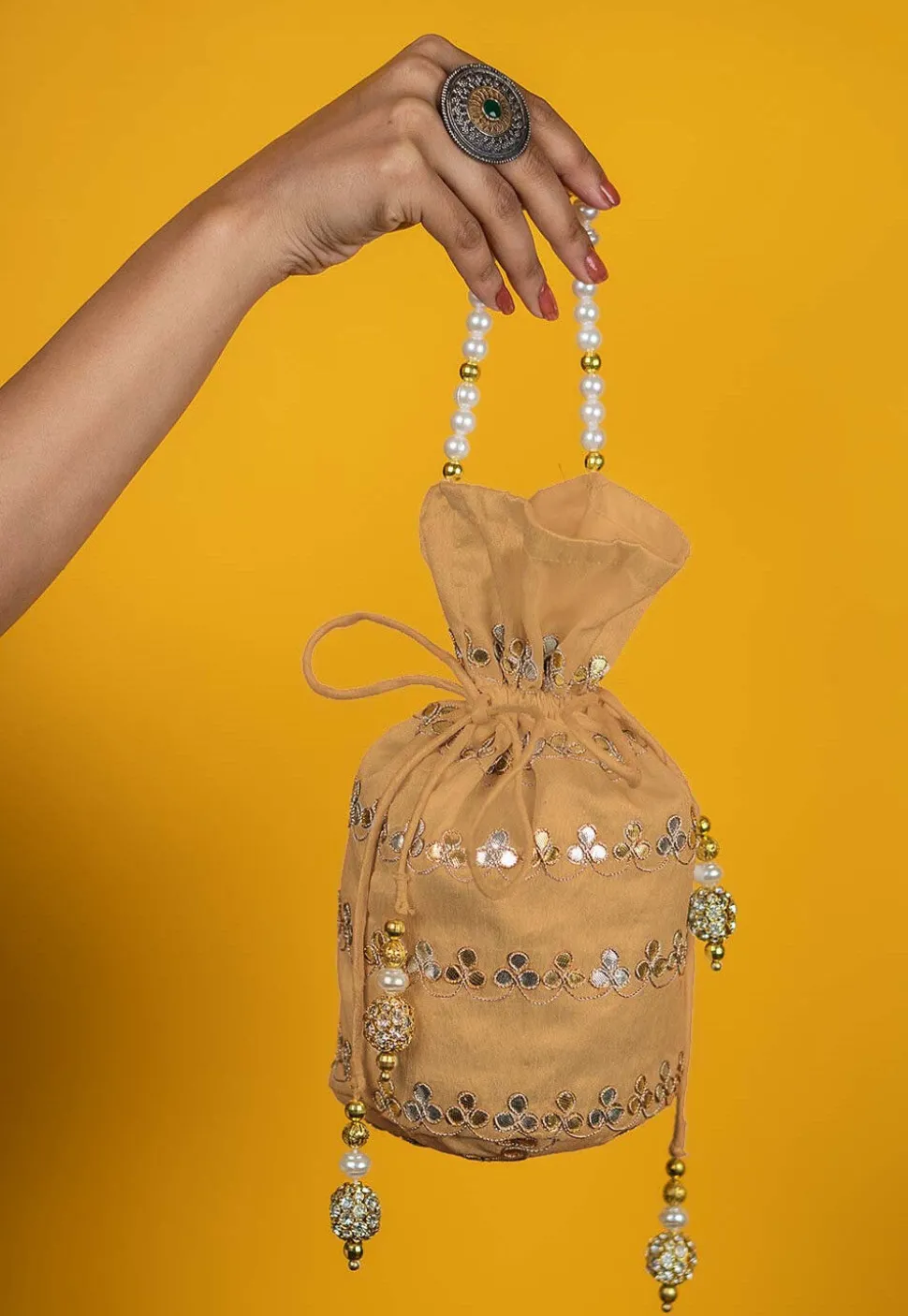 Gota Patti Art Silk Potli Bag in Beige