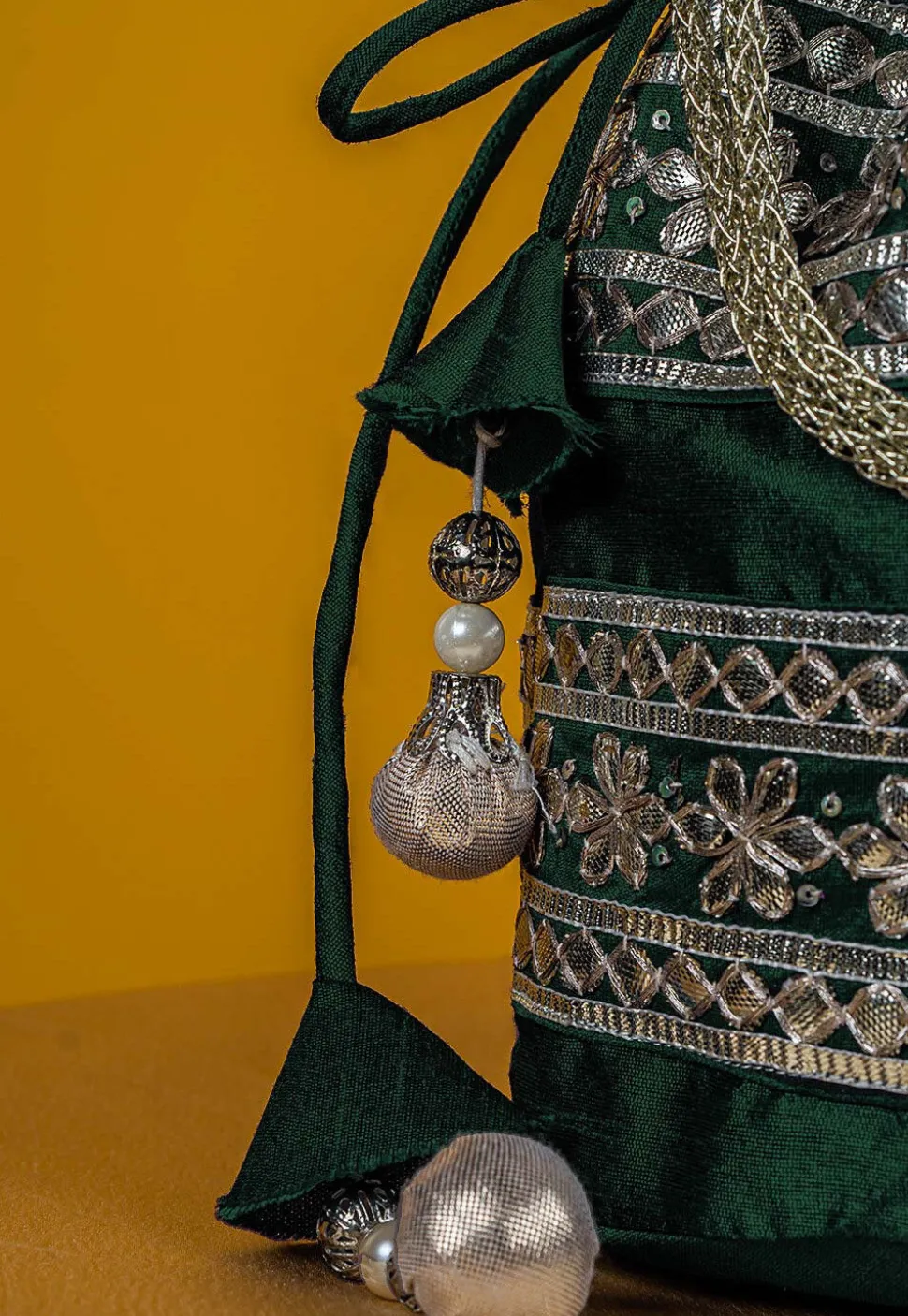 Gota Patti Art Silk Potli Bag in Dark Green