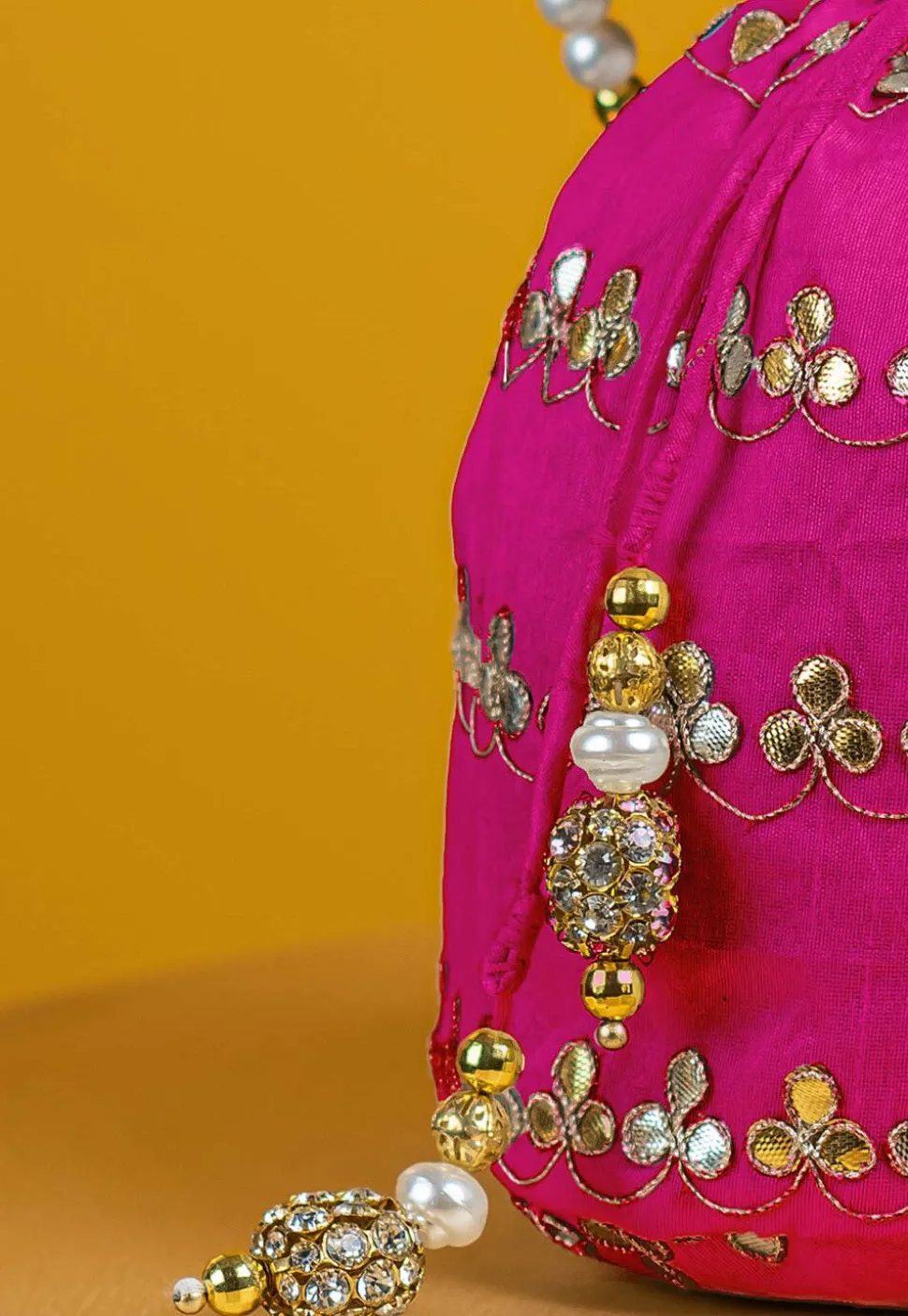 Gota Patti Art Silk Potli Bag in Fuchsia