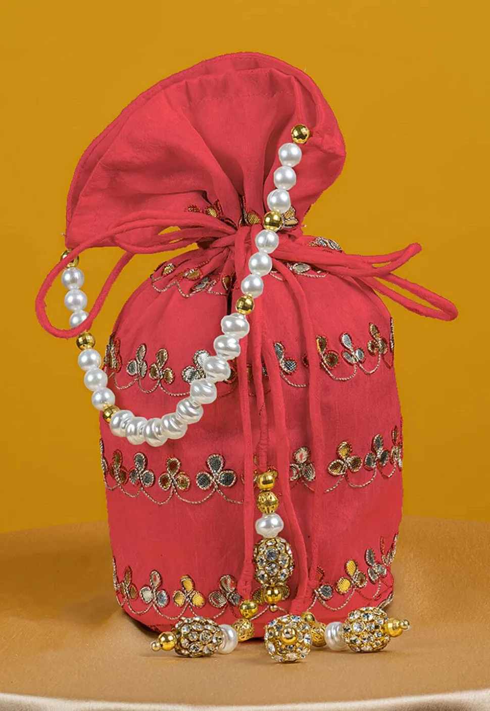 Gota Patti Art Silk Potli Bag in Peach