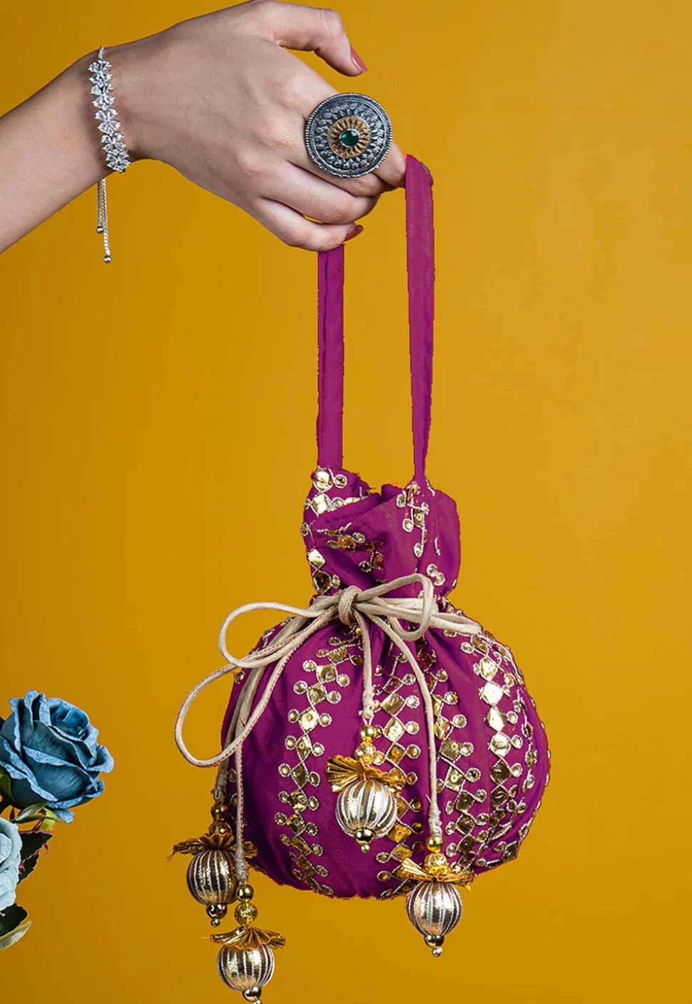 Gota Patti Art Silk Potli Bag in Magenta