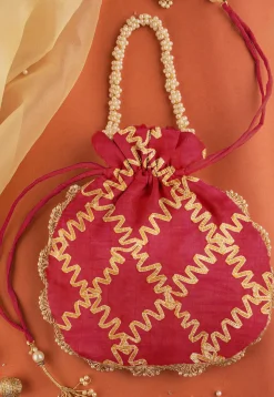 Gota Work Art Silk Two Tone Potli Bag in Magenta