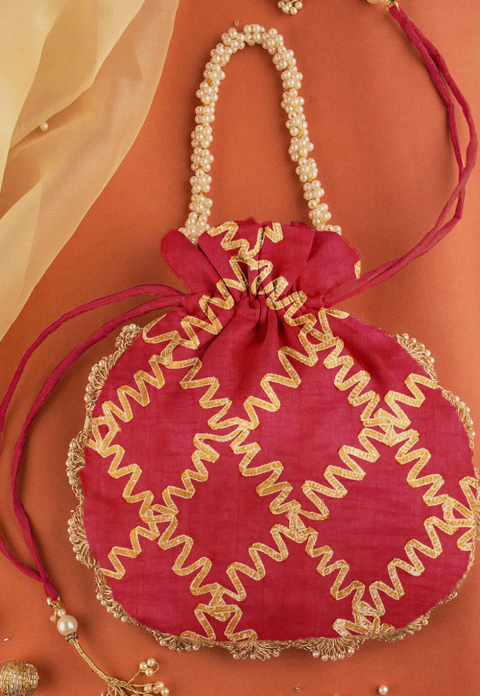 Gota Work Art Silk Two Tone Potli Bag in Magenta