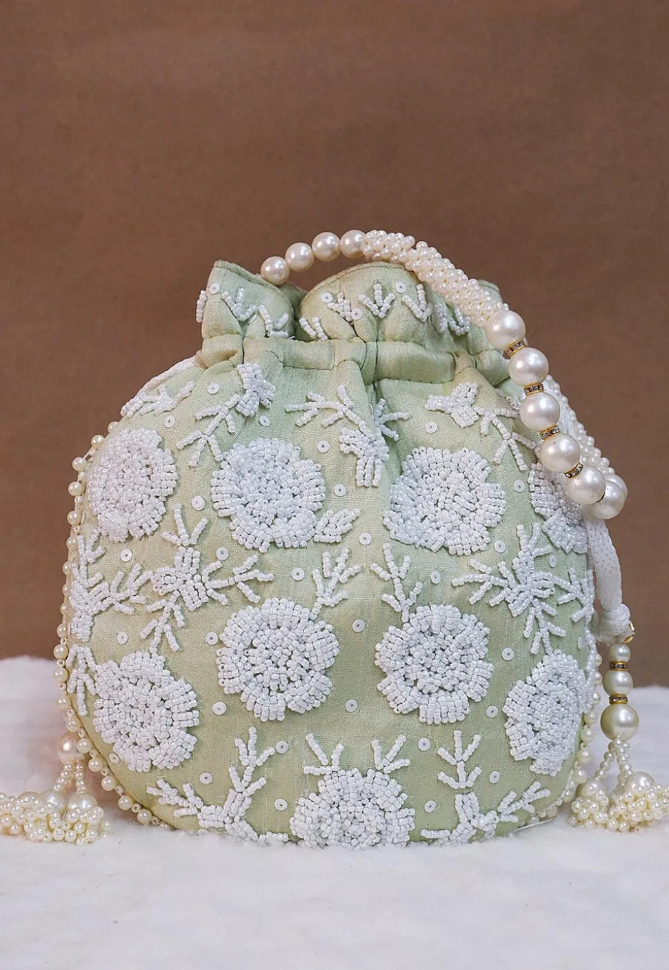 Hand Embroidered Art Silk Potli Bag in Pastel Green