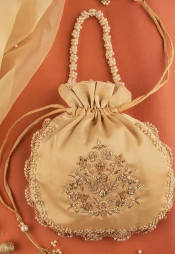 Hand Embroidered Art Silk Potli Bag in Beige