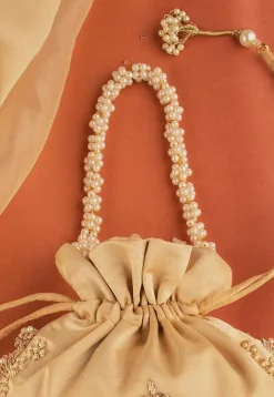 Hand Embroidered Art Silk Potli Bag in Beige