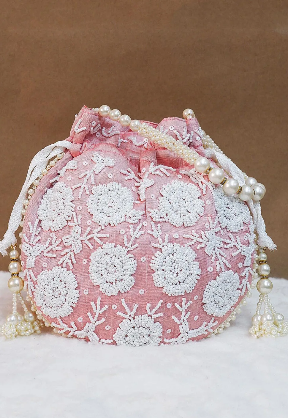 Hand Embroidered Art Silk Potli Bag in Pink