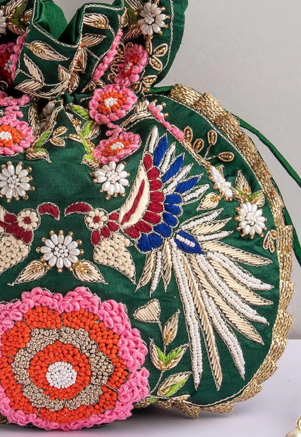 Hand Embroidered Art Silk Potli Bag in Dark Green