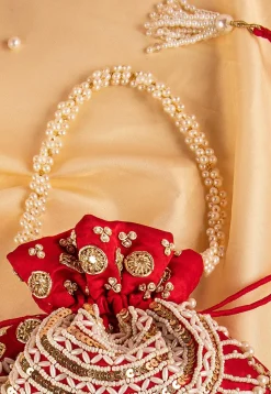 Hand Embroidered Art Silk Potli Bag in Red