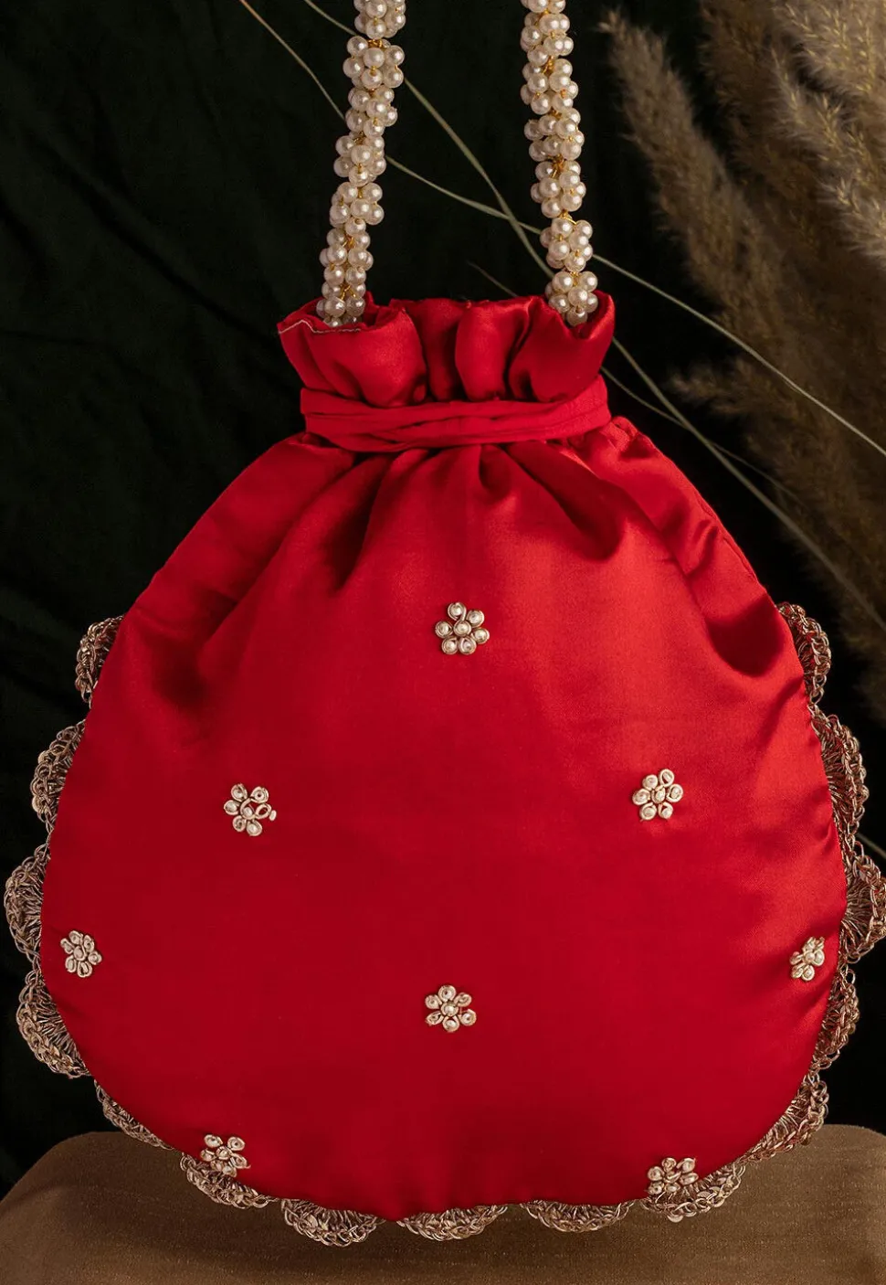 Hand Embroidered Art Silk Potli Bag in Red