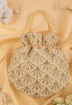 Hand Embroidered Art Silk Potli Bag in Beige