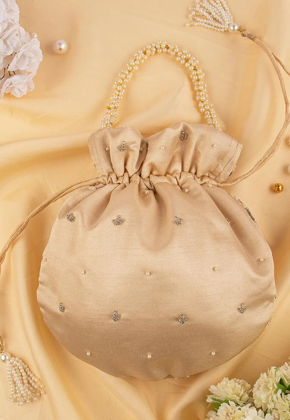 Hand Embroidered Art Silk Potli Bag in Beige