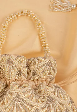Hand Embroidered Art Silk Potli Bag in Beige