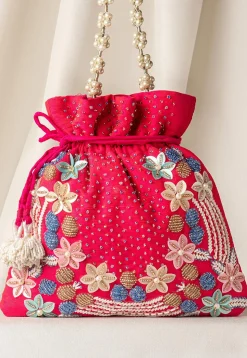Hand Embroidered Art Silk Potli Bag in Fuchsia