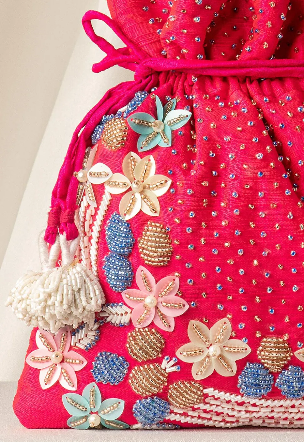 Hand Embroidered Art Silk Potli Bag in Fuchsia