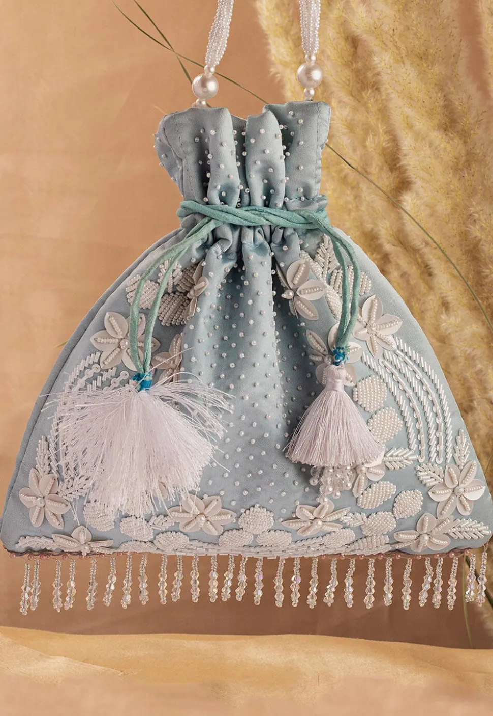 Hand Embroidered Art Silk Potli Bag in Pastel Blue