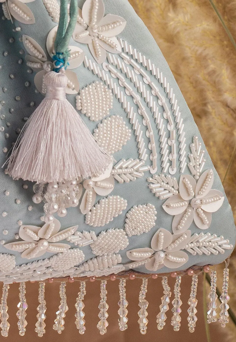 Hand Embroidered Art Silk Potli Bag in Pastel Blue