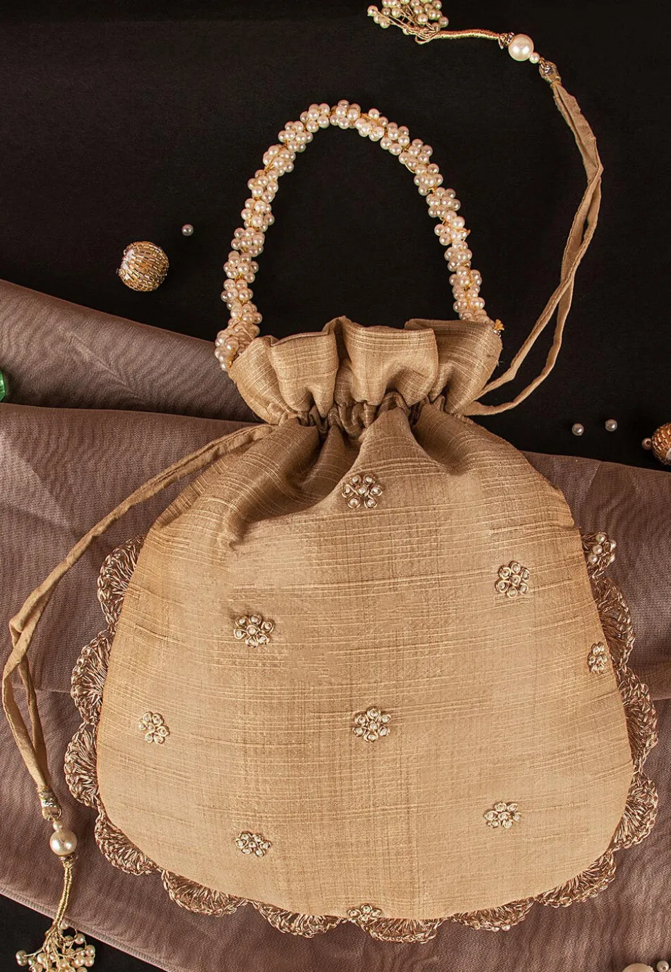 Hand Embroidered Art Silk Potli Bag in Beige