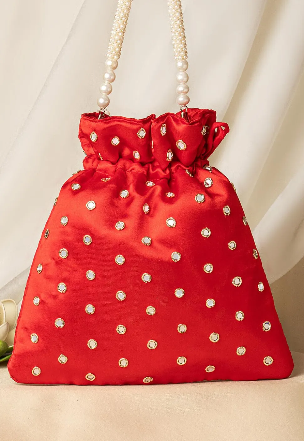 Hand Embroidered Art Silk Potli Bag in Red