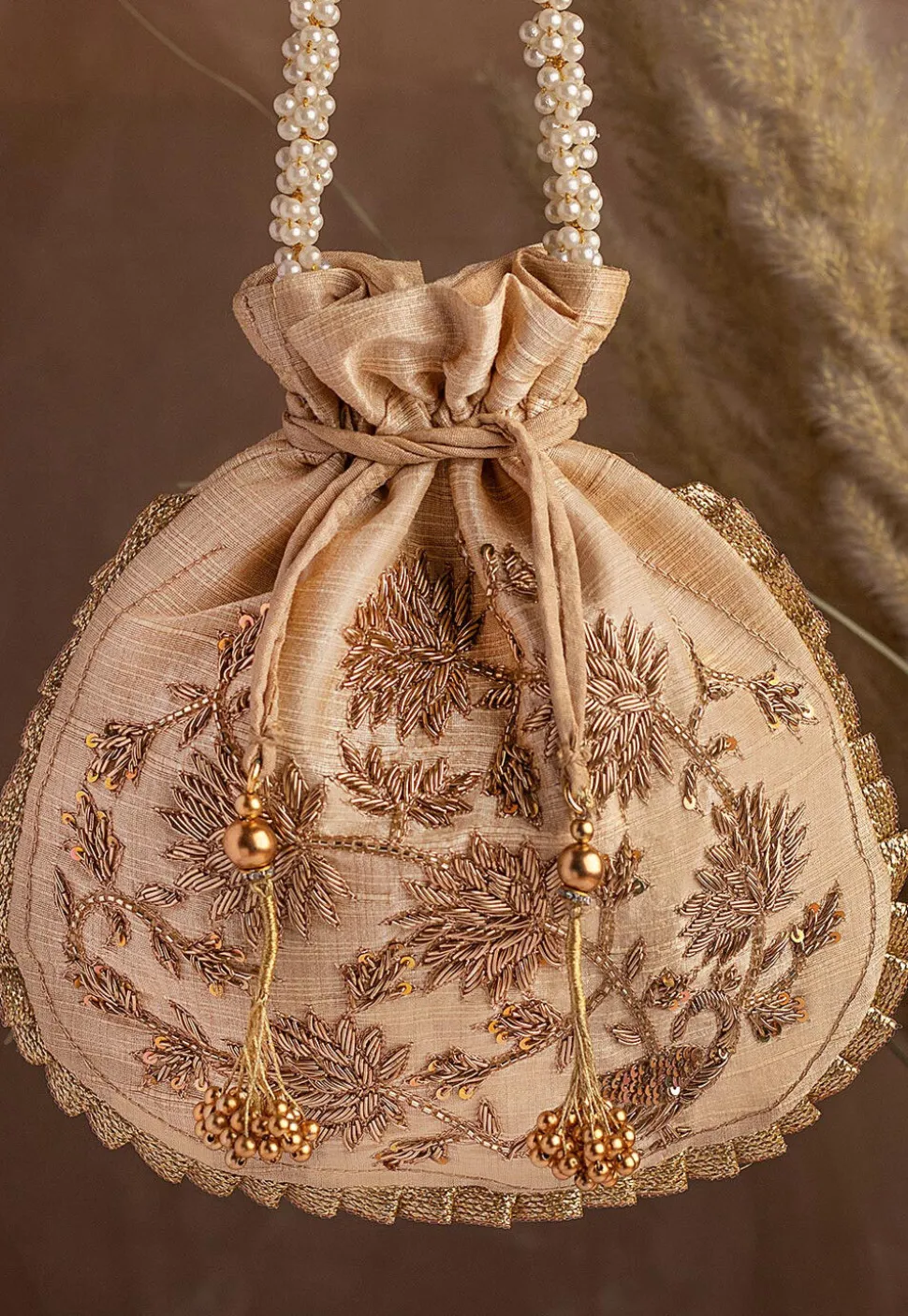 Hand Embroidered Art Silk Potli Bag in Beige