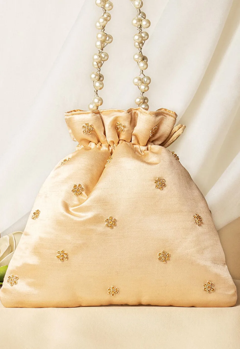 Hand Embroidered Art Silk Potli Bag in Beige