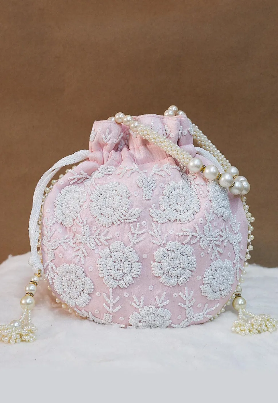 Hand Embroidered Art Silk Potli Bag in Baby Pink