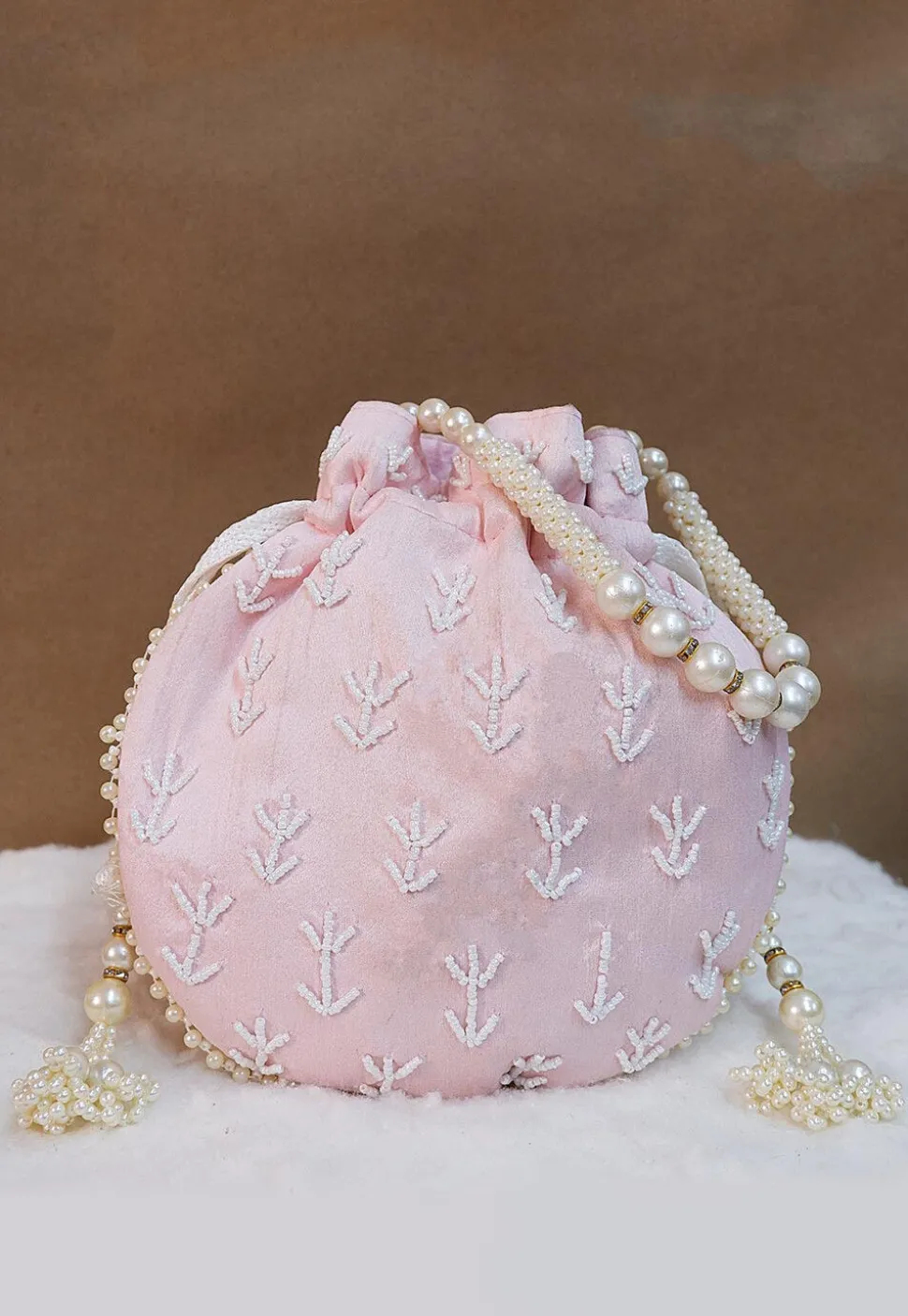 Hand Embroidered Art Silk Potli Bag in Baby Pink