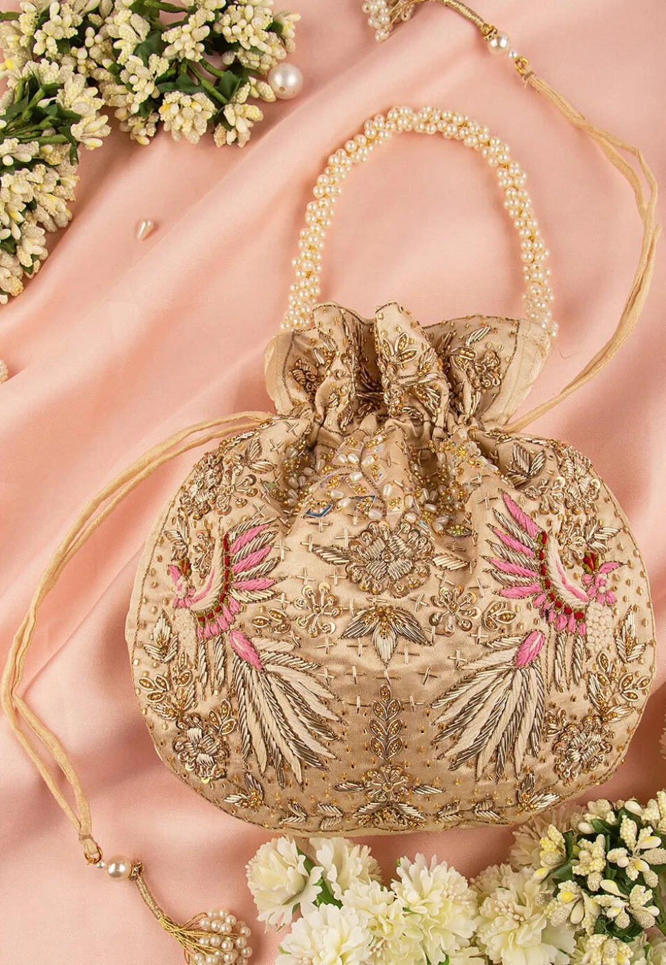 Hand Embroidered Art Silk Potli Bag in Beige