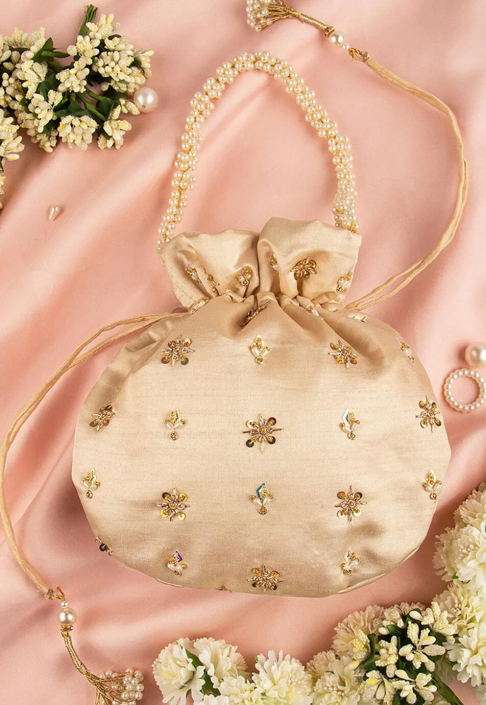 Hand Embroidered Art Silk Potli Bag in Beige