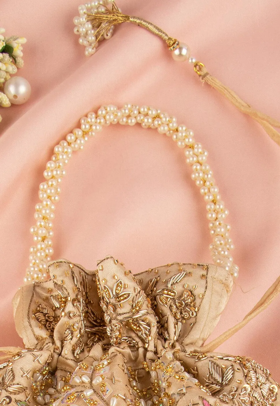 Hand Embroidered Art Silk Potli Bag in Beige