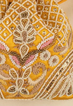 Hand Embroidered Art Silk Potli Bag in Mustard