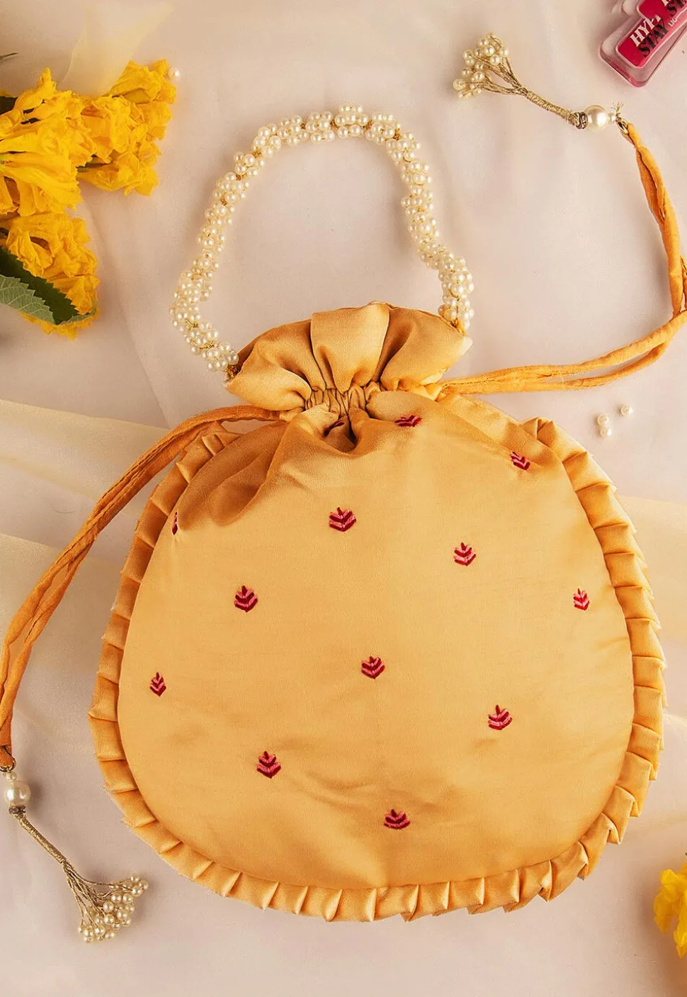 Hand Embroidered Art Silk Potli Bag in Beige