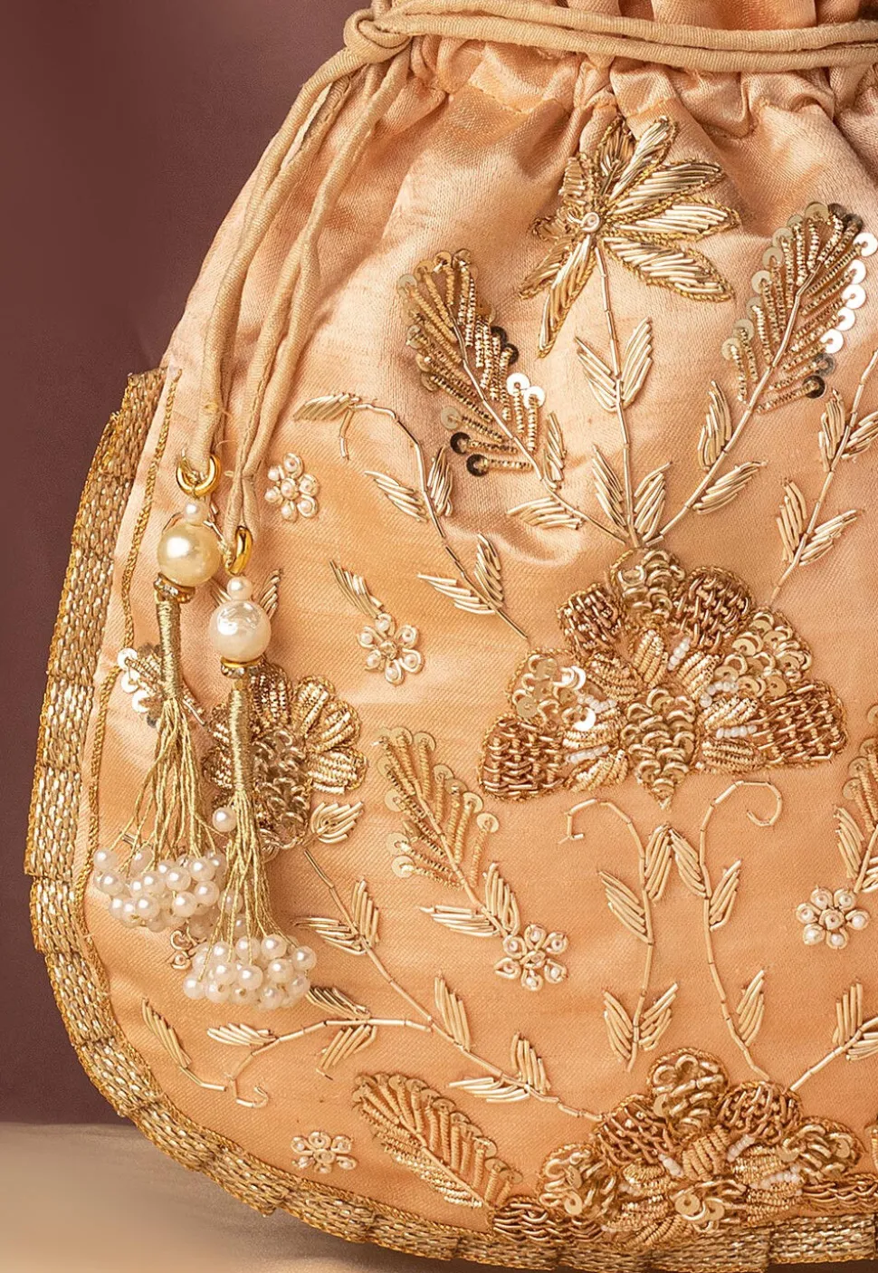 Hand Embroidered Art Silk Potli Bag in Rose Gold