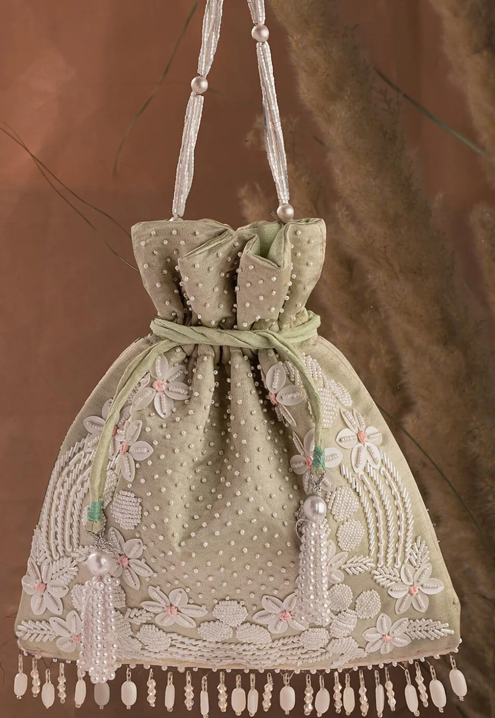 Hand Embroidered Art Silk Potli Bag in Pastel Green