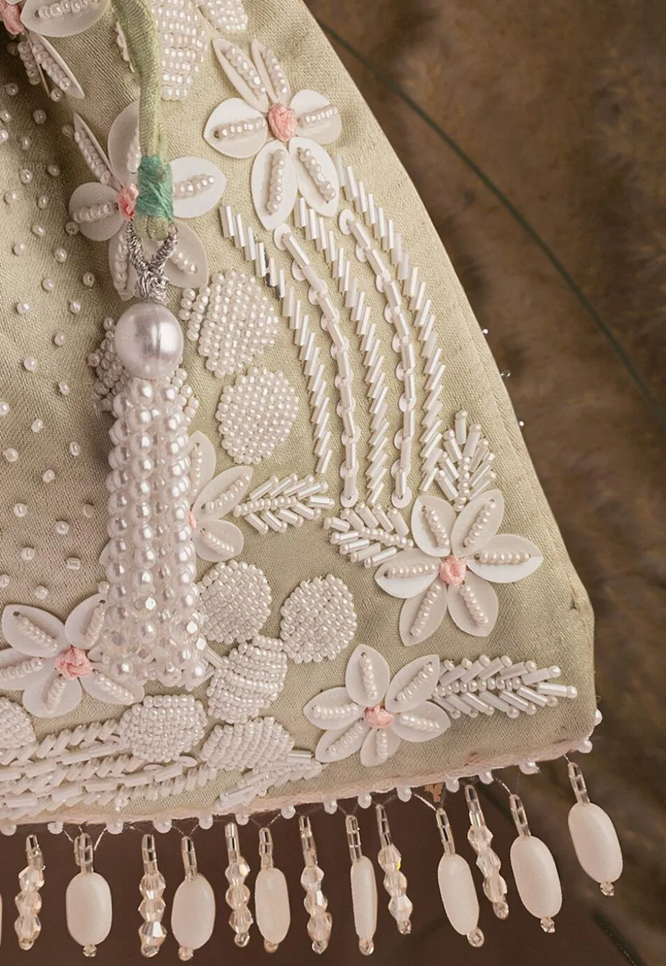 Hand Embroidered Art Silk Potli Bag in Pastel Green