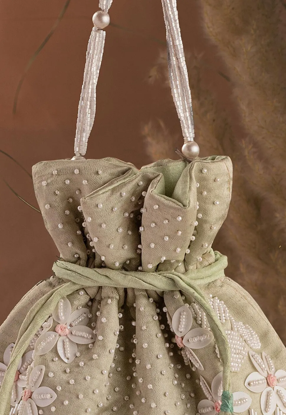 Hand Embroidered Art Silk Potli Bag in Pastel Green