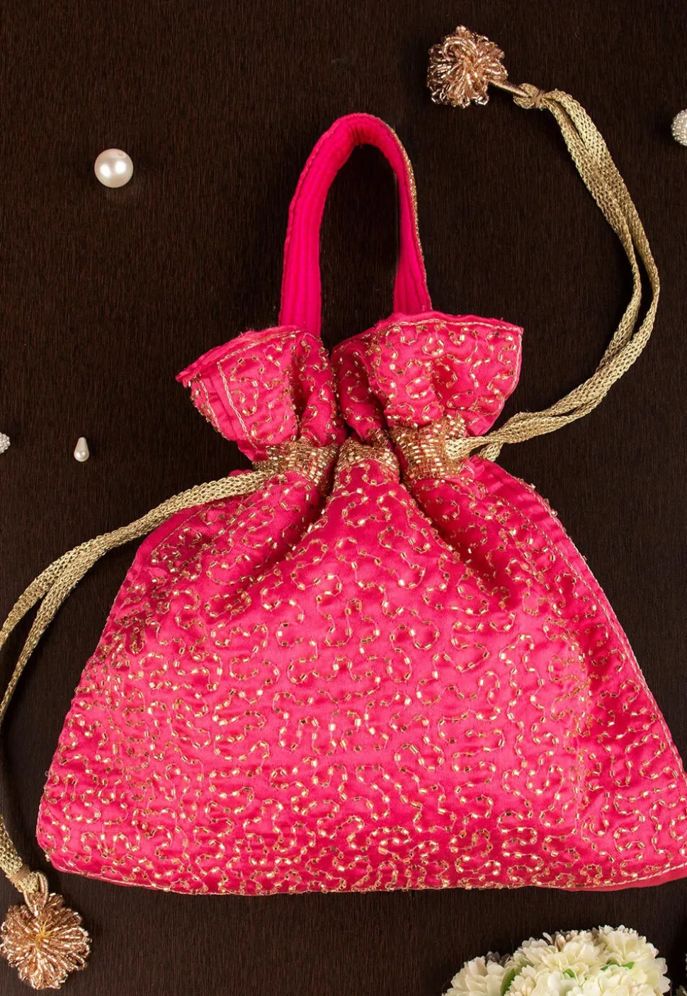 Hand Embroidered Art Silk Potli Bag in Fuchsia