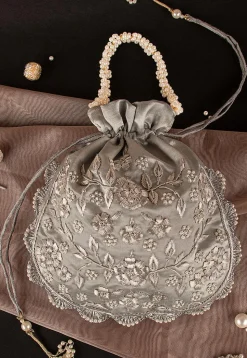 Hand Embroidered Art Silk Potli Bag in Silver