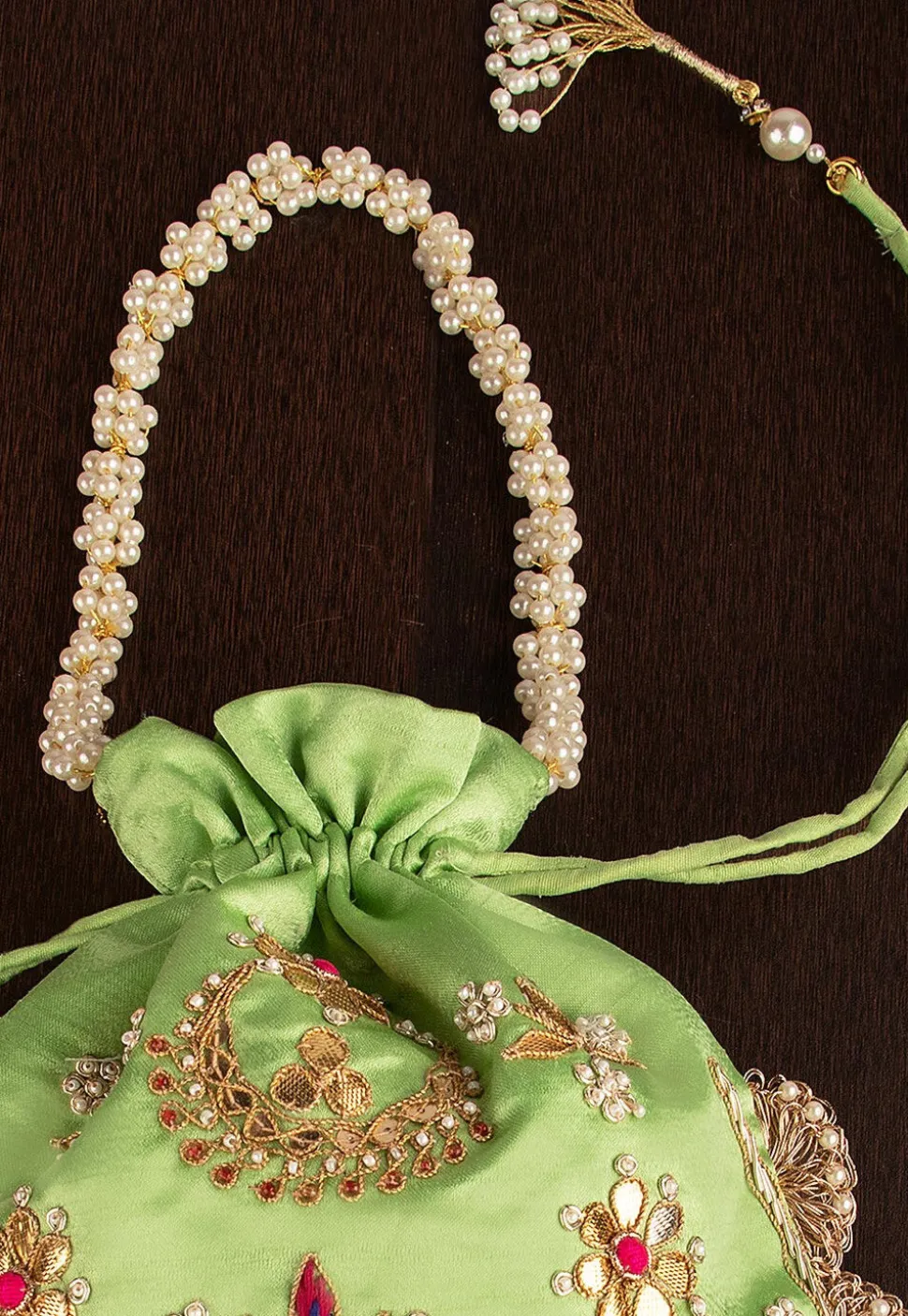 Hand Embroidered Art Silk Potli Bag in Green