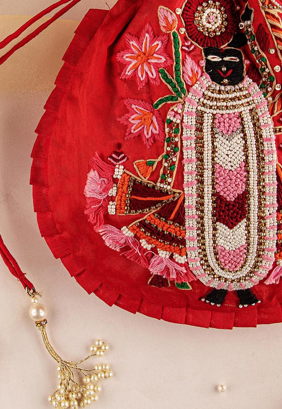 Hand Embroidered Art Silk Potli Bag in Red