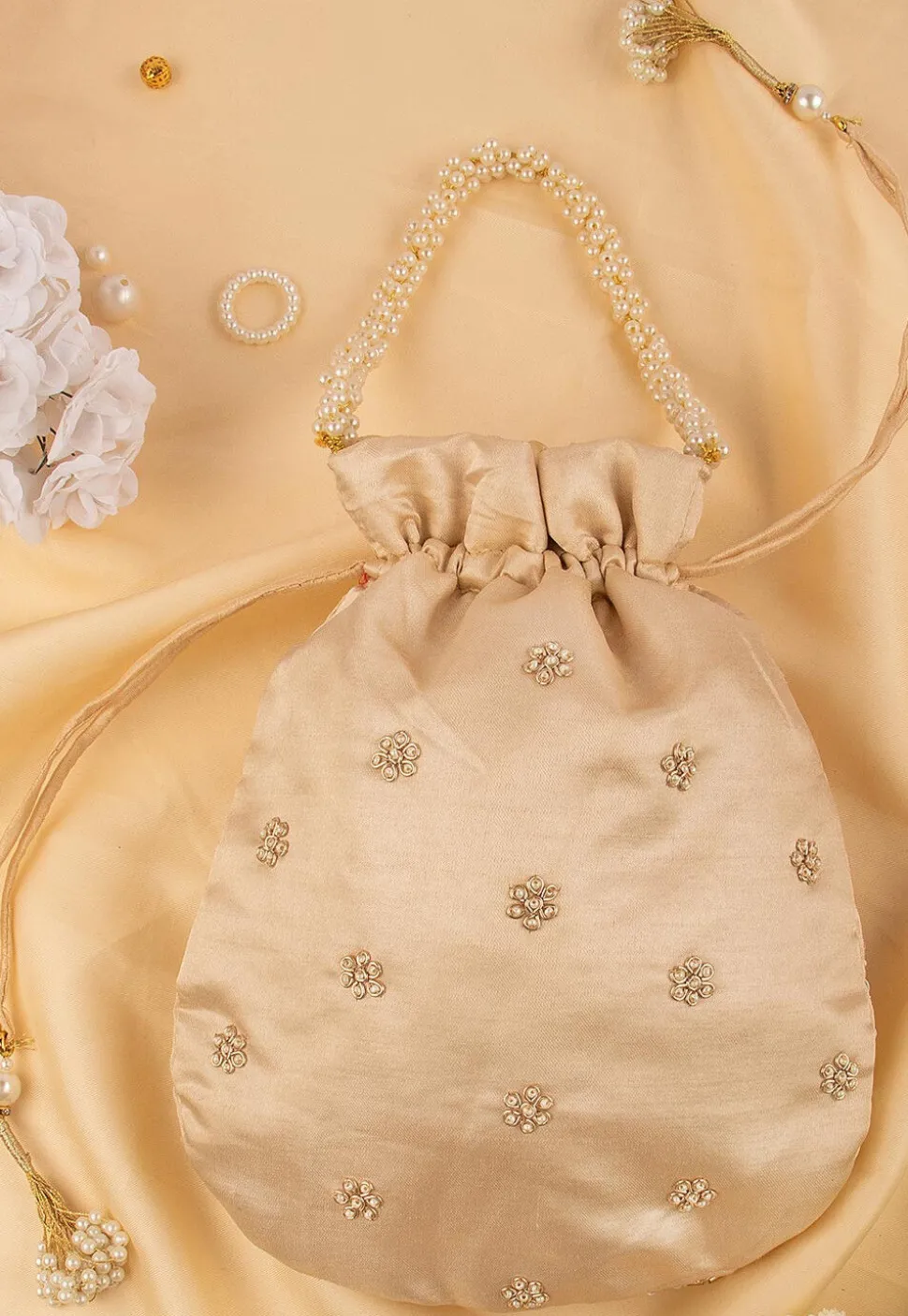 Hand Embroidered Art Silk Potli Bag in Beige