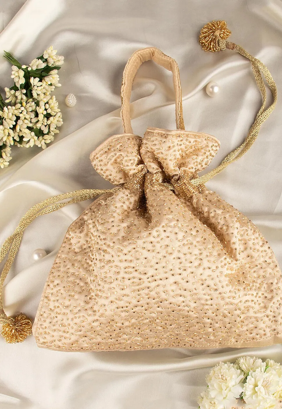 Hand Embroidered Art Silk Potli Bag in Beige