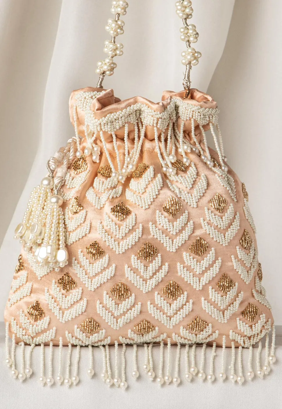 Hand Embroidered Art Silk Potli Bag in Rose Gold