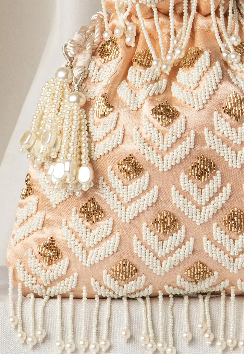 Hand Embroidered Art Silk Potli Bag in Rose Gold