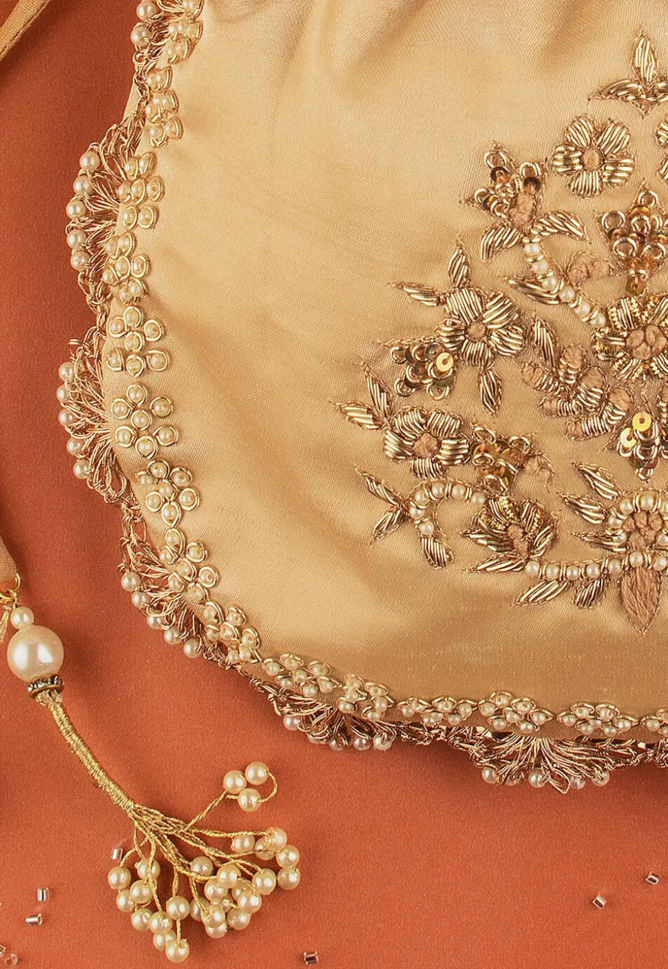 Hand Embroidered Art Silk Potli Bag in Beige