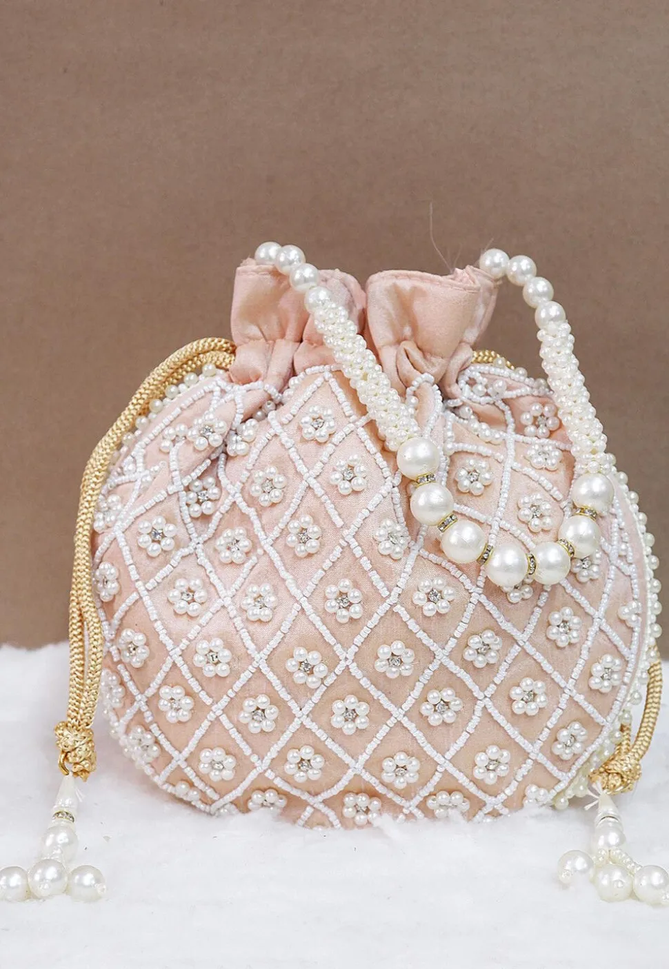 Hand Embroidered Art Silk Potli Bag in Rose Gold