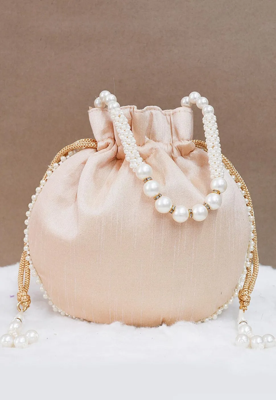 Hand Embroidered Art Silk Potli Bag in Rose Gold