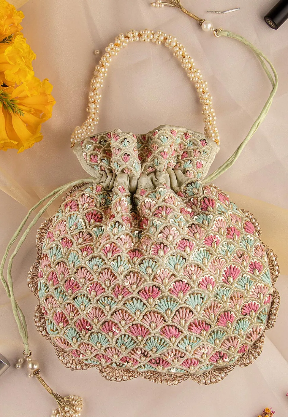 Hand Embroidered Art Silk Potli Bag in Pastel Green