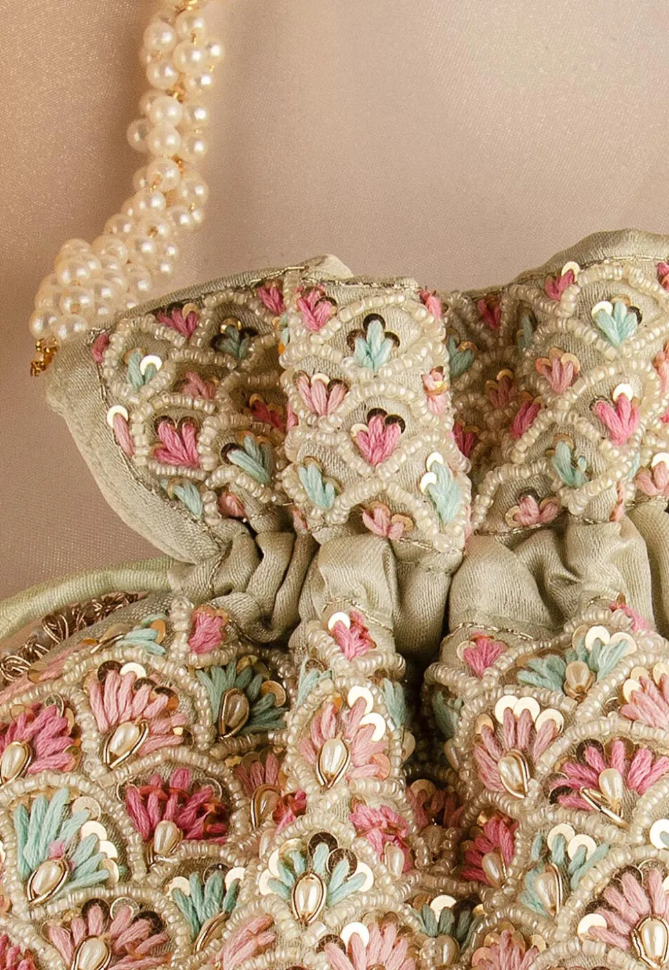 Hand Embroidered Art Silk Potli Bag in Pastel Green