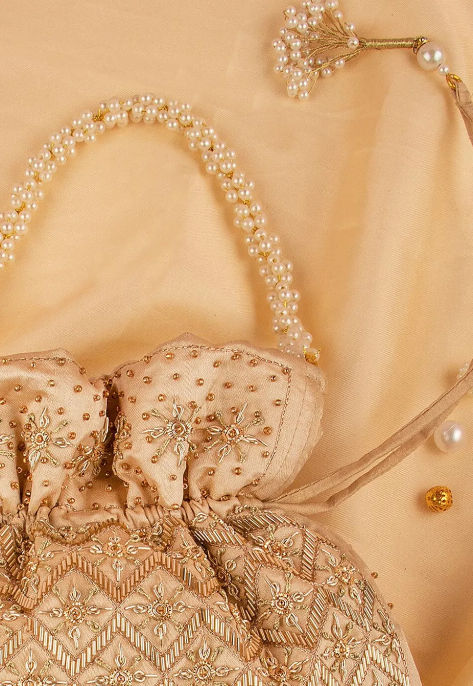 Hand Embroidered Art Silk Potli Bag in Dark Beige